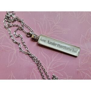 Xander Hawthorne pendant necklace made with The Inheritance Games book pages
